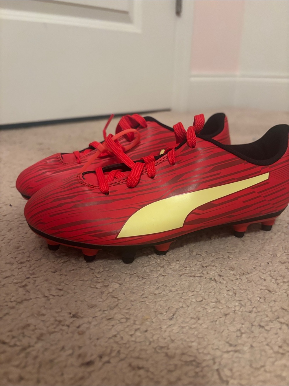 Puma Kids Red Soccer Cleats with Yellow Formstrip